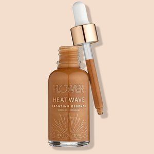 C- Flower by Drew Barrymore HEATWAVE BRONZING ESSENCE qty 1
